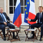 FILE PHOTO: French President Emmanuel Macron meets with Russia&rsquo;s President Vladimir Putin, at his summer retreat of the Bregancon fortress on the Mediterranean coast, near the village of Bormes-les-Mimosas